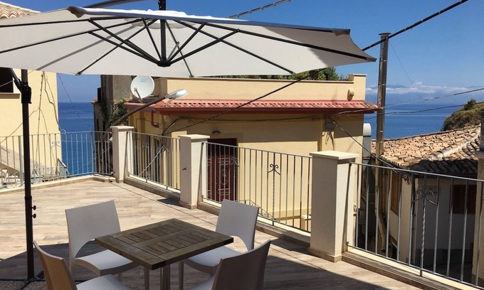 Pizzo Apartment | Inviting Apartment with Sea View Terrace & Breakfast Included