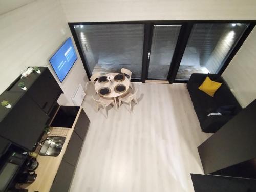 Syote Apartment | Modern Cabin Retreat in Iso-Syöte with Hot Tub & Fireplace
