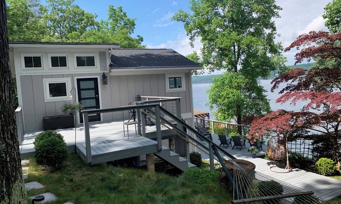 Northwest Ithaca Cottage | Cozy Lakehouse Retreat near Ithaca with Hot Tub & Dock