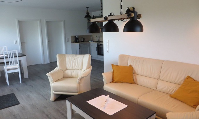 Dornumergrode Apartment | Cozy Huus up Höcht Apartment with Family-Friendly Amenities