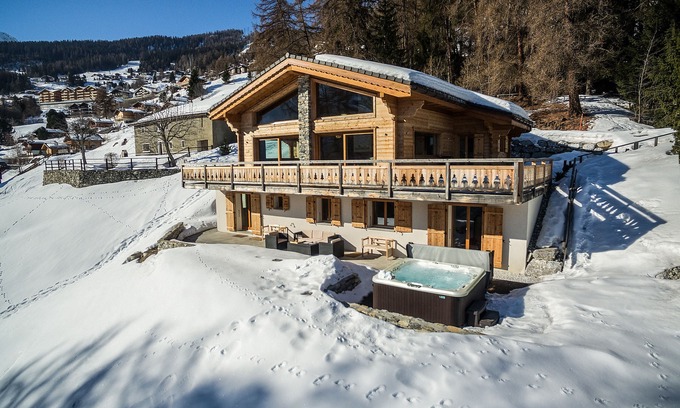 Mayens-de-Riddes Ski Chalet | Chalet Charbray: 10/10 Rated Retreat with Hot Tub & Sauna