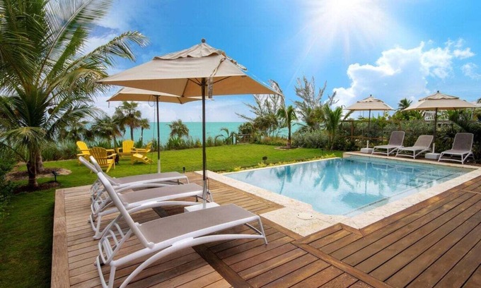 North Palmetto Point House | Exclusive Beachfront Villa with Private Heated Pool