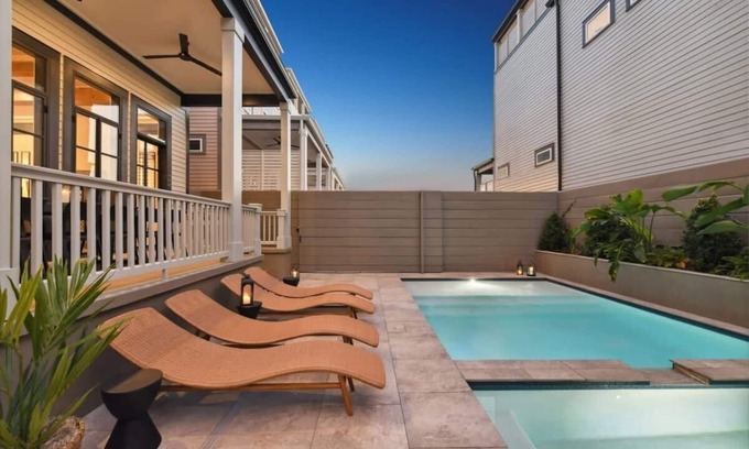 Faubourg Lafayette House | Elegant Home with Heated Pool and Inviting Hot Tub