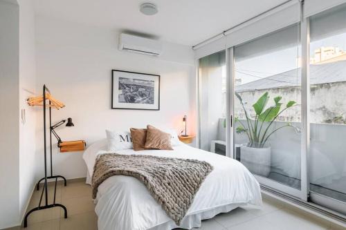 Constitucion Apartment | Experience Elegance in San Telmo: Pool, BBQ & Gym