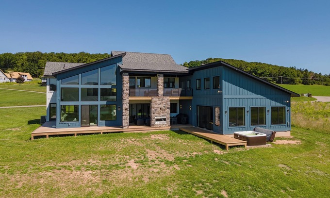 Waterfront Greens House | Escape to Namastay at the Lake: Relaxing Hot Tub & Views
