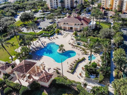 Inlet Villas Apartment | New Smyrna Luxury Beachfront Condo Pool Hot Tub