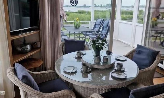 Hagen im Bremischen House | Discover The Little Red High House with Ocean View Bliss