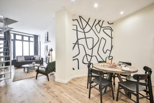 Ternes Apartment | Modern Triplex Near Porte Maillot - Family-Friendly Stay