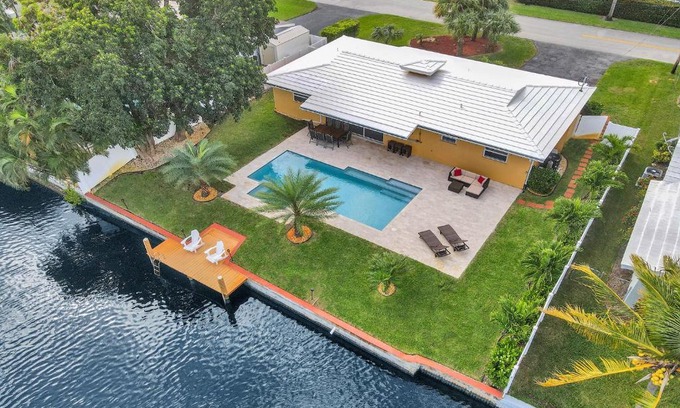 North Corals House | Waterfront Retreat with Heated Pool, Spa & Pet Friendly
