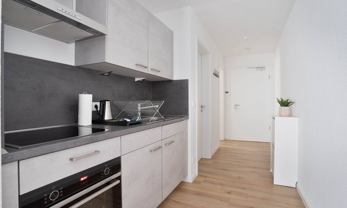 Osnabrueck Apartment | Modern Home2Share Apartment with Spa & Family Amenities