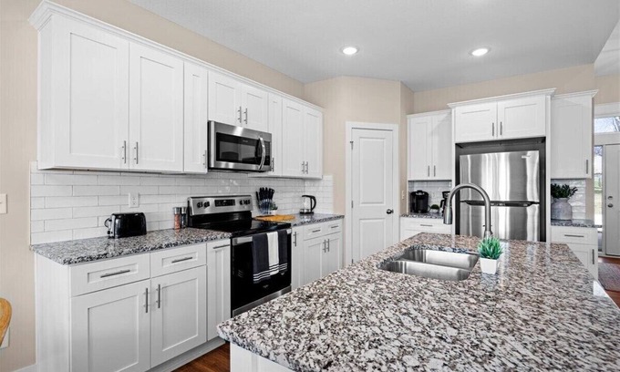 Blue Township House | Modern 4-Bedroom Ranch Home with Creekside Serenity