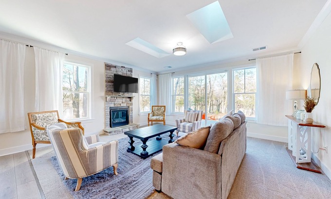 Seaford House | Inviting Riverfront Retreat with Dock, Game Room & Spa