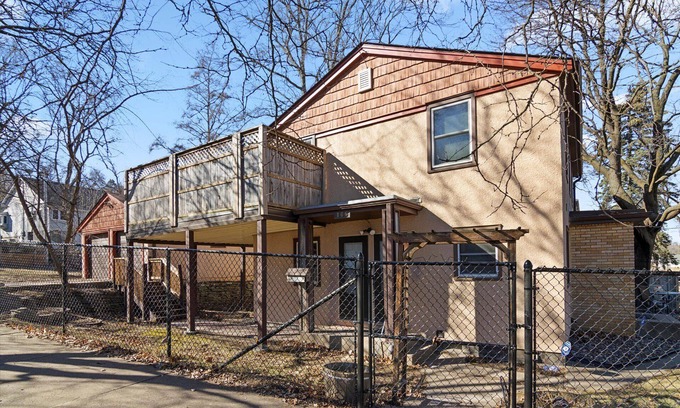West Side House | Inviting Home with Outdoor Deck and Kitchen Amenities