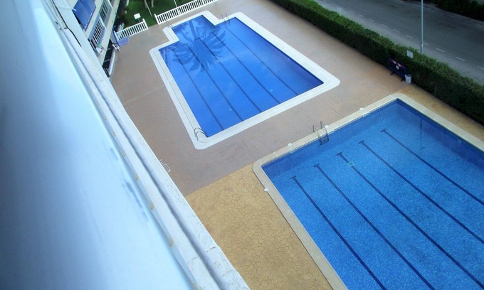 Punta Prima Apartment | Inviting Holiday Home with Pool, 3 Min to Beach & Shops