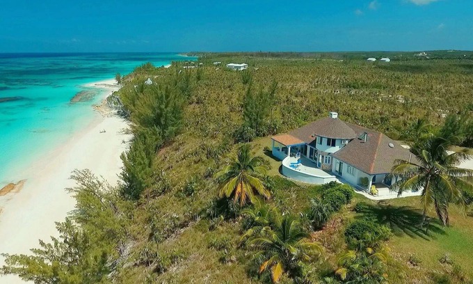 North Palmetto Point House | Secluded Beachfront Estate with Pool & Breathtaking Views