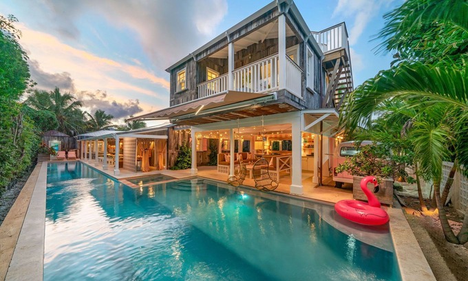 Dunmore Town House | Stylish Retro Bungalow Just Steps from the Beach & Pool
