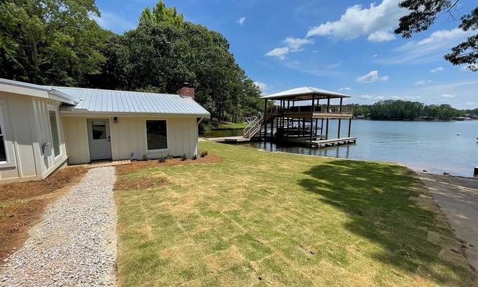 Dadeville Cabin | Renovated Lakefront Cabin with Dock & Boat Ramp at Lake Martin