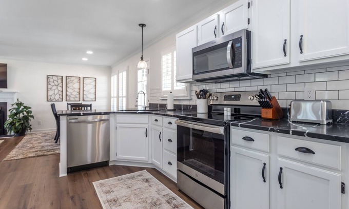 Cary House | Modern Getaway in Cary with Spa and Breakfast Included