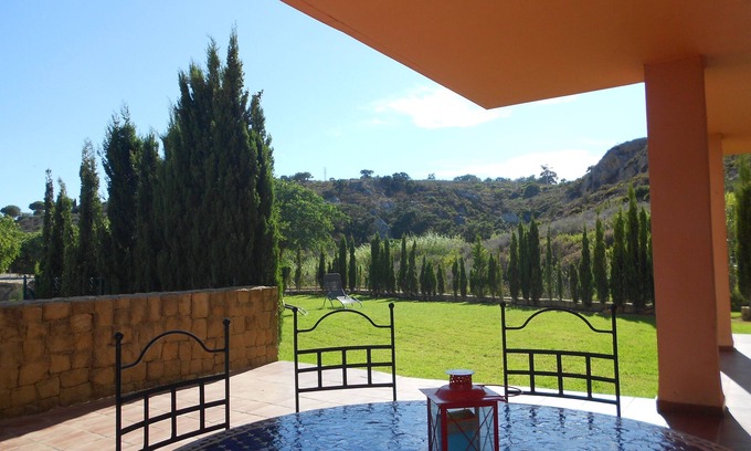 Manilva Apartment | Idyllic Sotogrande Apartment with Ocean Views & Private Garden