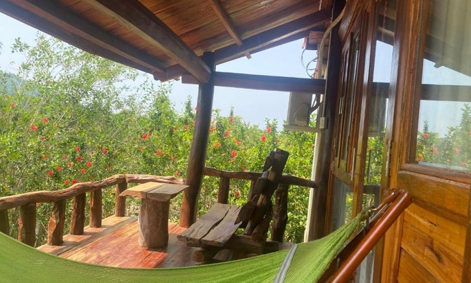 Quan Tom Cabin | Eco-Friendly Ngọc Tiên Farmer Lodge with Ocean Views