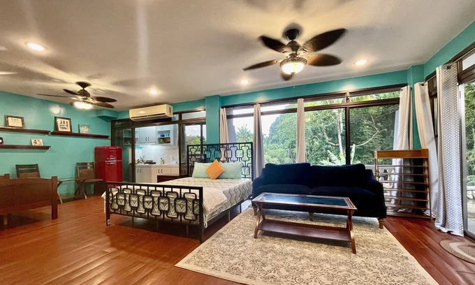 Koror Cabin | Ngermid Oasis: Studio with Kitchen & Scenic Pool Views