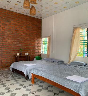 Dong Hoa House | Pet-Friendly Retreat at Nhà Tranh for Families