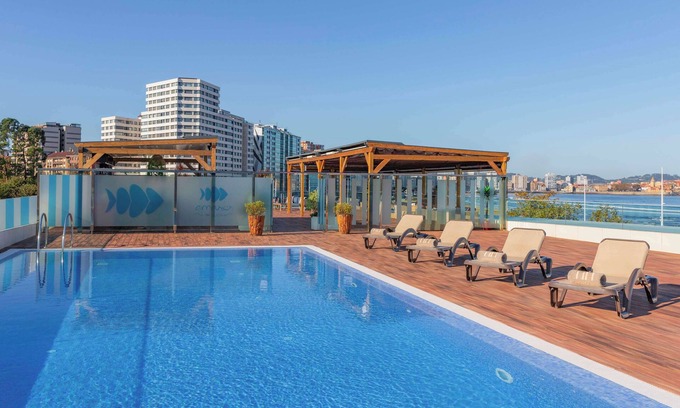 El Pison Hotel | Discover NH Gijón: A 4-Star Retreat with Spa & Pool