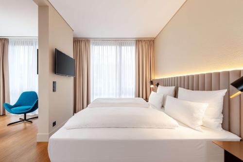 Munchen District Apartment | Elegant NH München Unterhaching: 4-Star Comfort Awaits