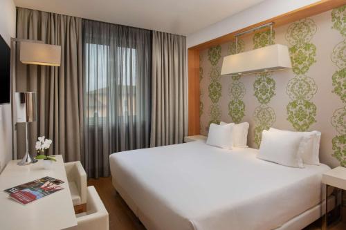 Pisa City Centre Hotel | Discover NH Pisa: Pet Friendly with Pool & Breakfast Included