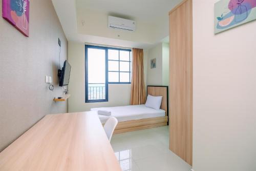 Pondokcina Apartment | Nice 2BR at 26th Floor Evenciio Margonda Apartment By Travelio