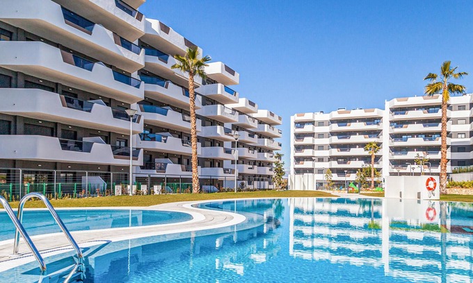 Els Arenals del Sol Apartment | Bright Apartment with Pool and Ocean View for Your Escape