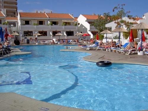 San Eugenio Apartment | Inviting Beachfront Apartment with Pool and Ocean View