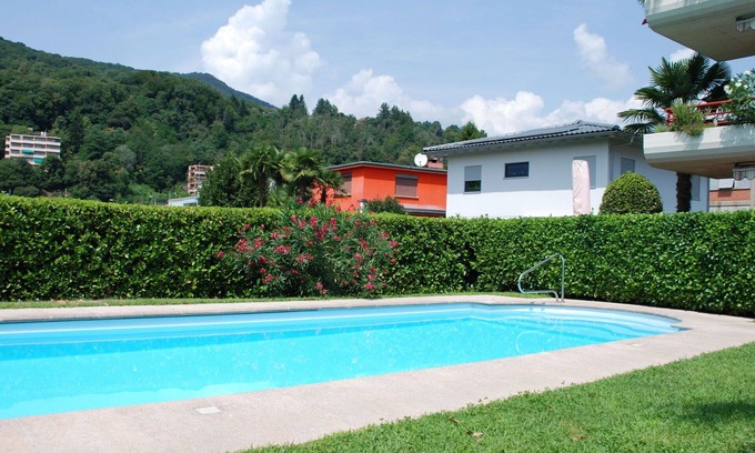 Caslano Apartment | Inviting Apartment for 4 with Pool, WIFI, and Pet-Friendly Perks