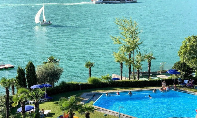 Bissone Apartment | Nice apartment for 4 people with WIFI, A/C, pool, TV, balcony and panoramic view