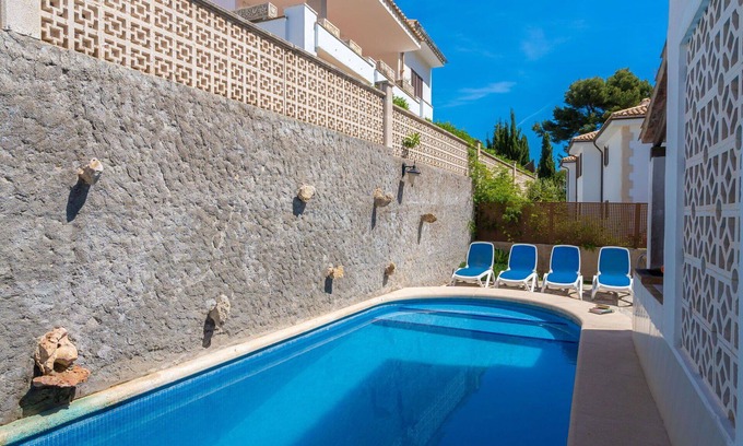 Cala Carbo Apartment | Spacious Apartment for 8 with Pool, Ocean View & A/C