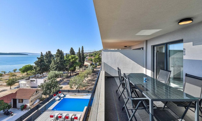 Seget Donji Apartment | Modern Family-Friendly Apartment Steps from the Beach