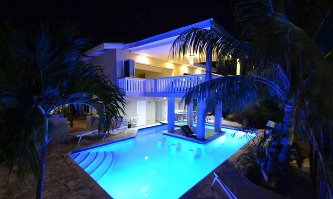 Cas Grandi Apartment | Cozy Studio Escape Steps from the Beach with Pool Access
