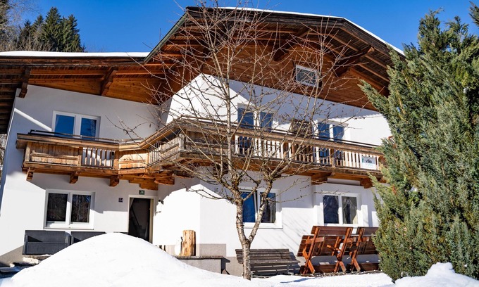 Ellmau Ski Chalet | Inviting Group Retreat with Sauna Near Ski Lifts & Bars