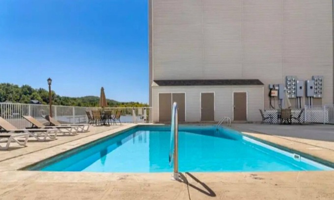 Camdenton Condo | Inviting Hotel with Pool, Dock Access & Scenic Lake Views
