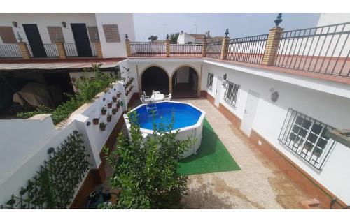 El Rocio House | Cozy Escape in El Rocio Almonte with Free Wifi & Pets Welcome