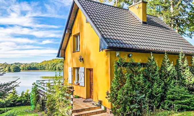 Szemud House | Lakefront Retreat: Unwind at the End of This Scenic Road