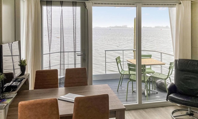 Biddinghuizen Boat Rental | Relaxing 2 Bedroom Stay with Lake View in Biddinghuizen