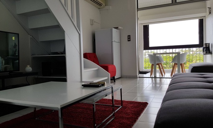 Bas du Fort Apartment | Stylish Duplex Steps from the Beach with Pool & Spa