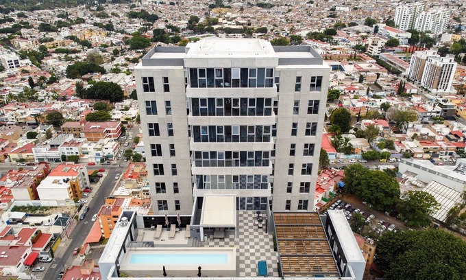 Financial District Condo | Guest-Favorite Nido GDL: Pool, Spa & Family-Friendly Comfort