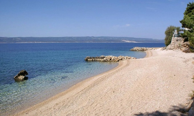 Pisak Apartment | Discover Niko: Steps to Pebble Beach with Oceanfront Views