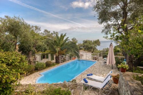Koutsi House | Experience Nikolette: Oceanfront Getaway with Pool Access