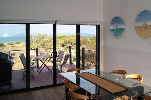 Dolphin Sands House | Discover Nine Mile Escape: Pet-Friendly Oceanfront Retreat