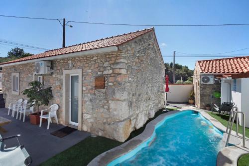 Fatima House | Experience Ninho do Rei: Family-Friendly with Pool Access