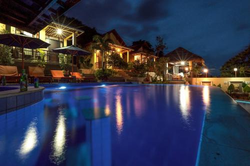 Senggigi Hotel | Cozy Nipah Villas: Oceanfront Stay with Pool & Pet Friendly