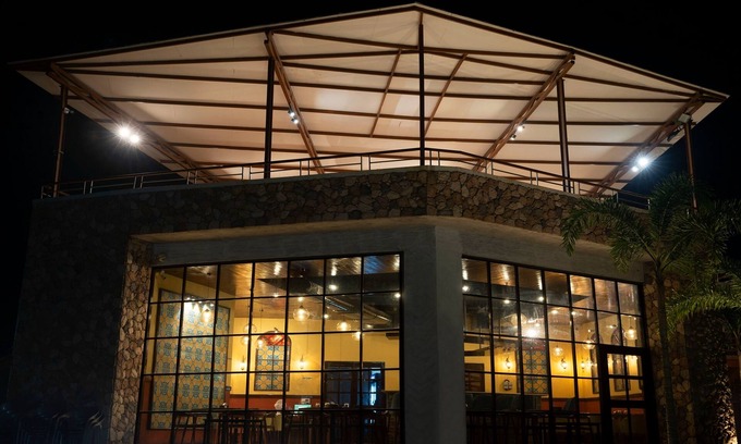 Ulhasnagar Hotel | Inviting Nirva The Cottage Resort: Pool, Hot Tub & More